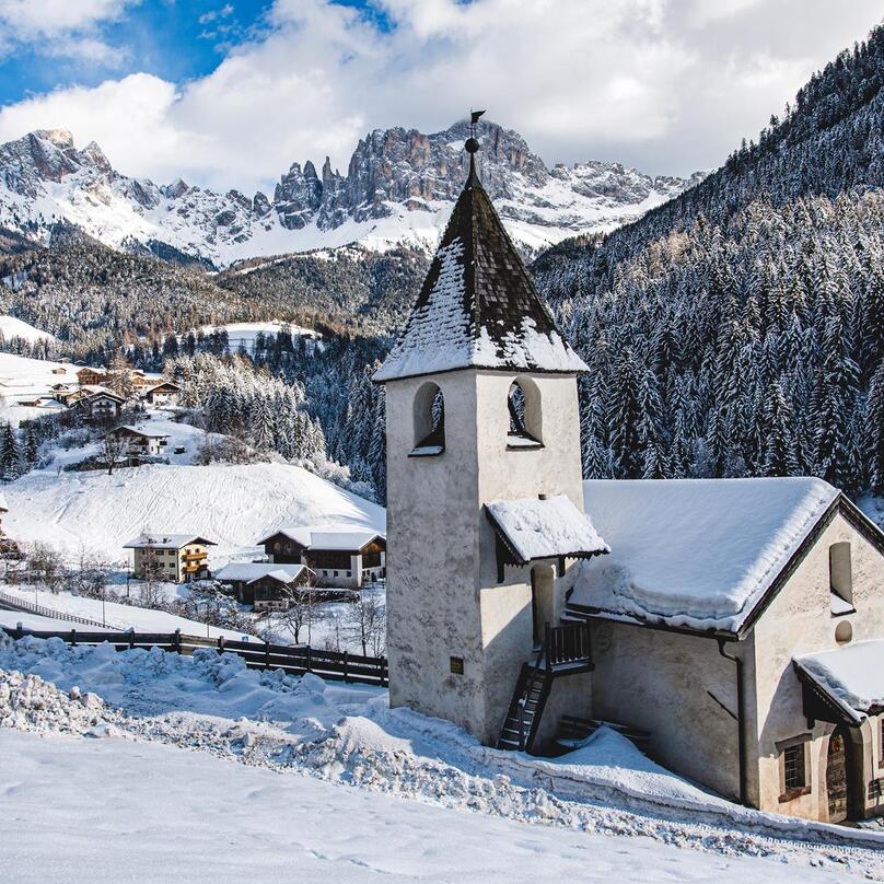 Tiers am Rosengarten mit Schnee bedeckt